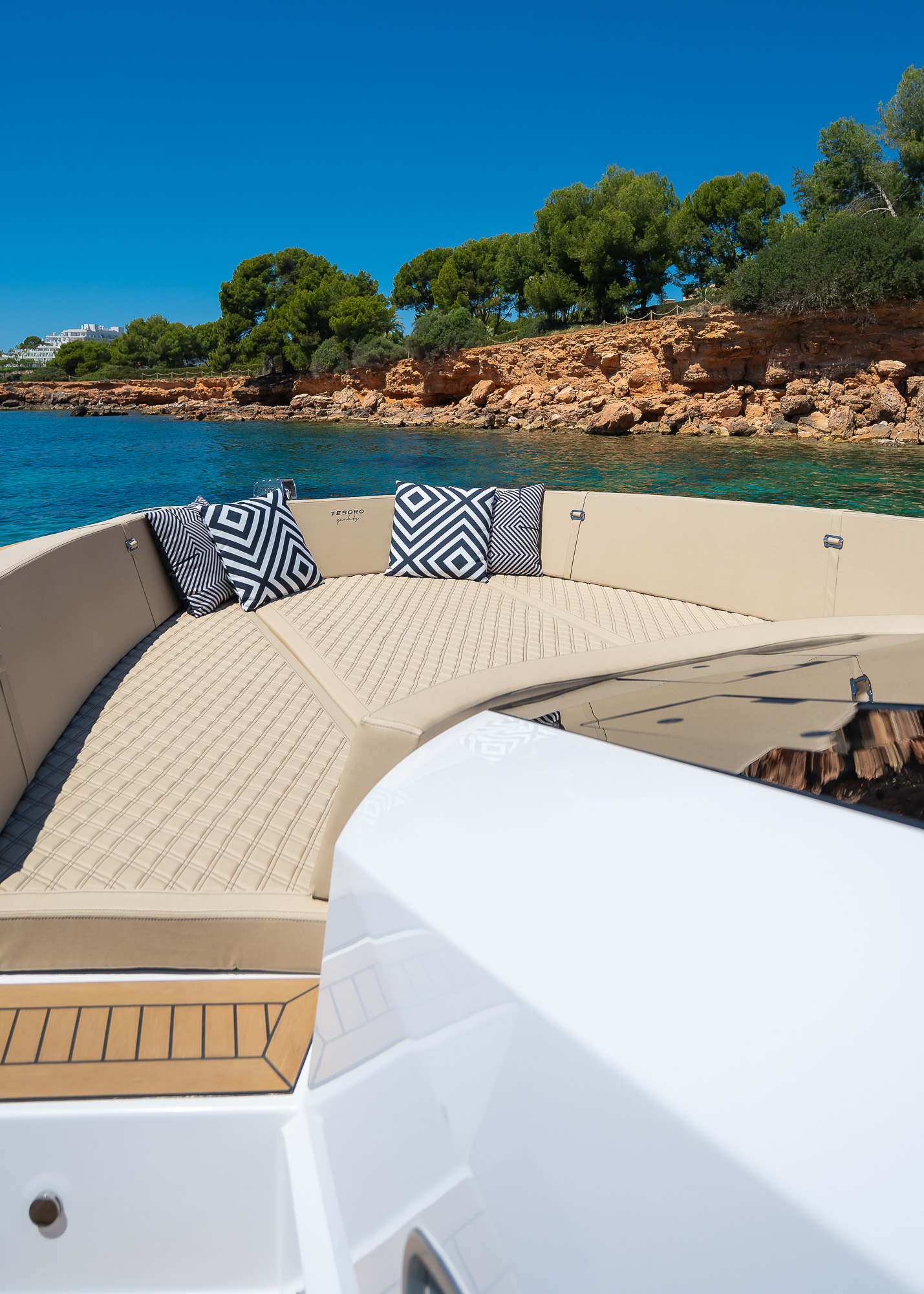 Tesoro T40 GTS New 2026 yacht charter in Mallorca — bow sunpads with views over the Balearic sea, from Puerto Portals.
