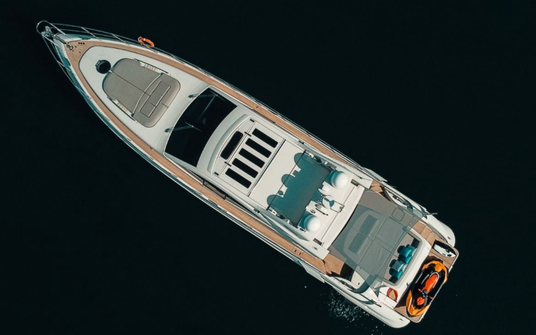 Azimut 68 S Esperanza yacht charter in Mallorca — bow sunpads with views over the Balearic sea, from Marina Palma, La Lonja.