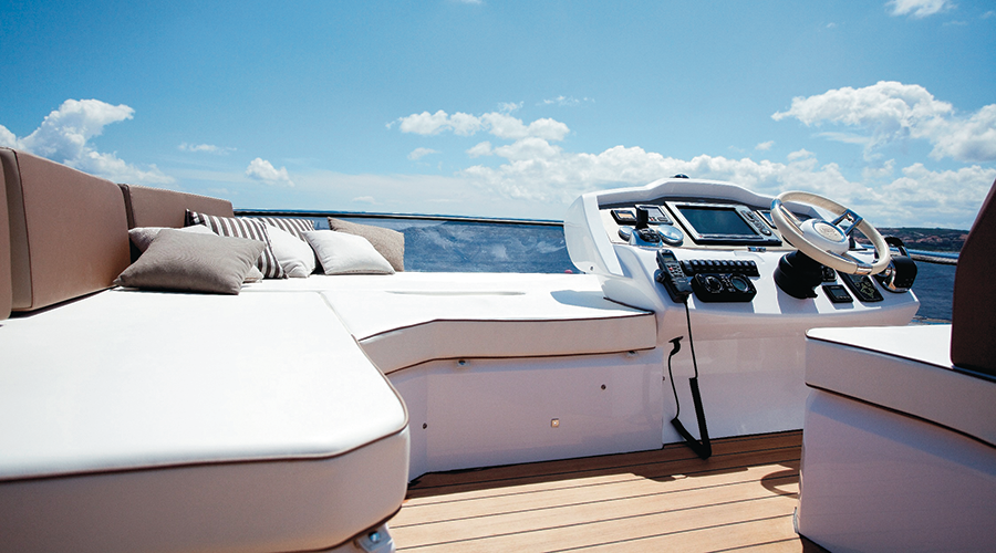 Sessa 40 Fly Zantastic yacht charter in Mallorca — cockpit lounge shaded for long Mediterranean lunches, from Club Nàutic Porto Cristo.