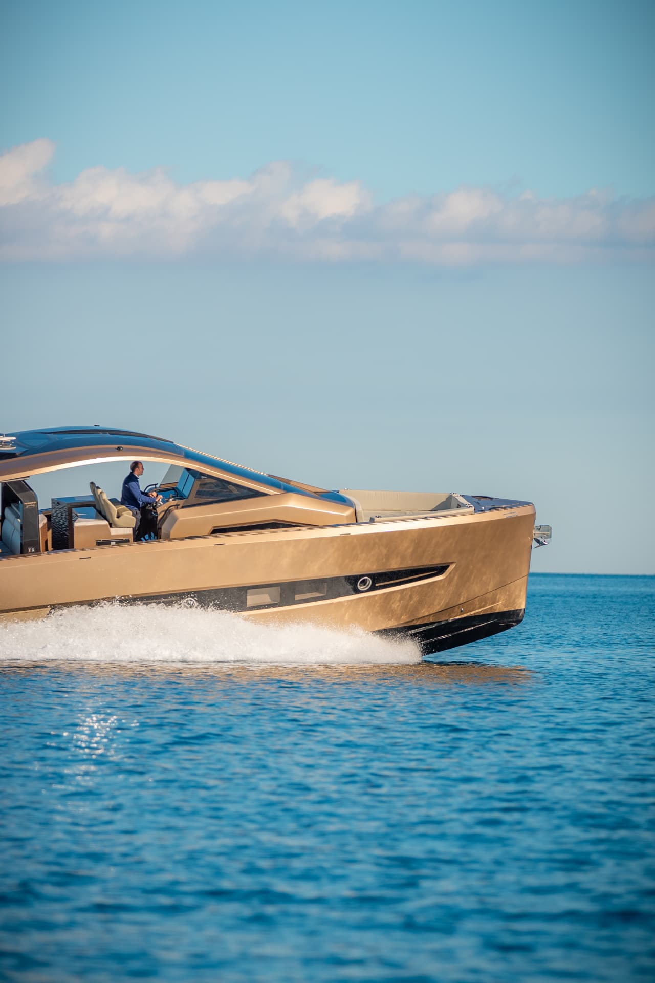 Tesoro T50 Speciale Goldfinger · Armani/Casa yacht charter in Mallorca — anchored in a turquoise cove near Puerto Portals, from Club de Mar, Palma.