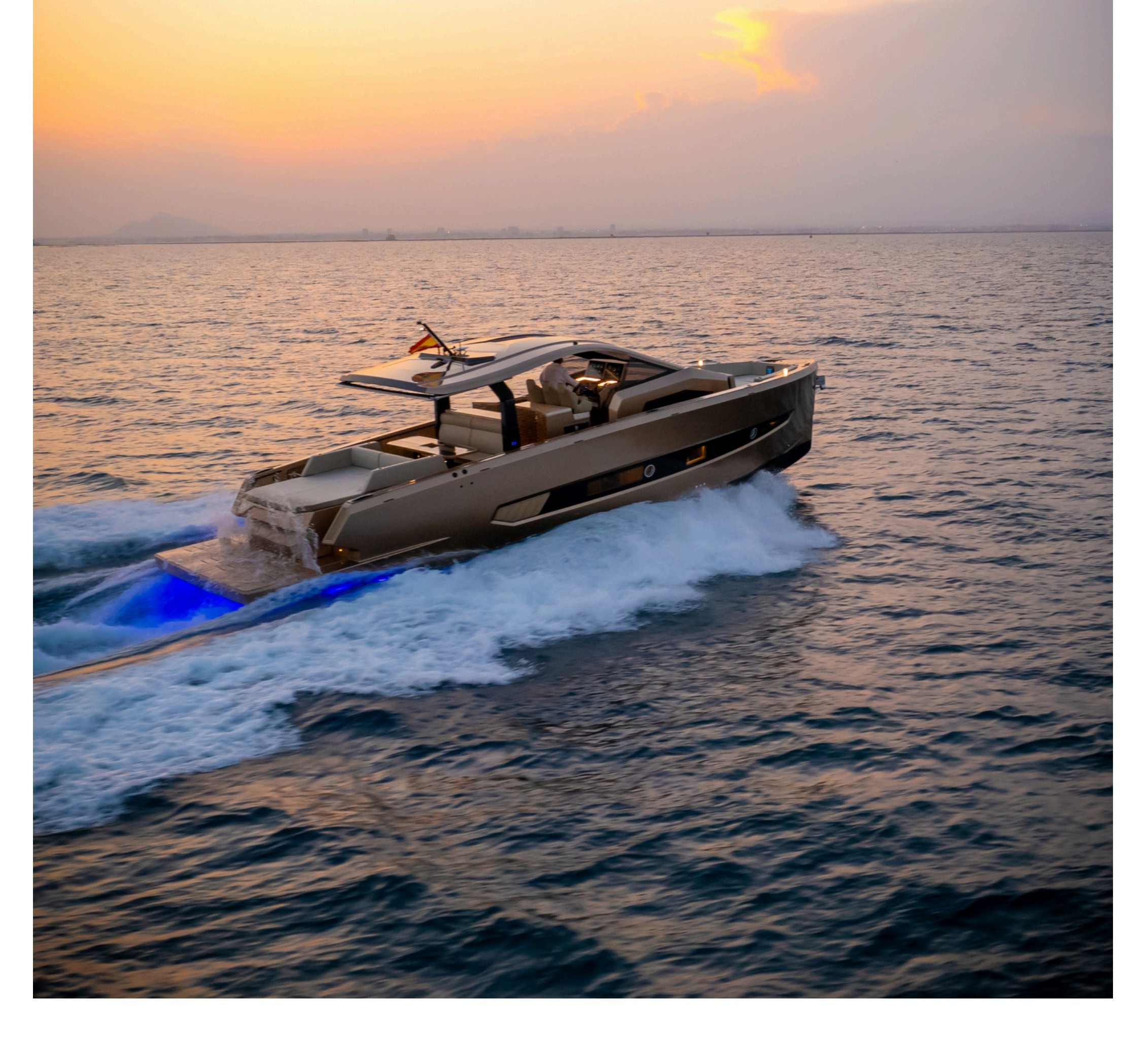 Tesoro T50 Speciale Goldfinger · Armani/Casa yacht charter in Mallorca — aft deck and swim platform ready for a day of swimming, from Club de Mar, Palma.