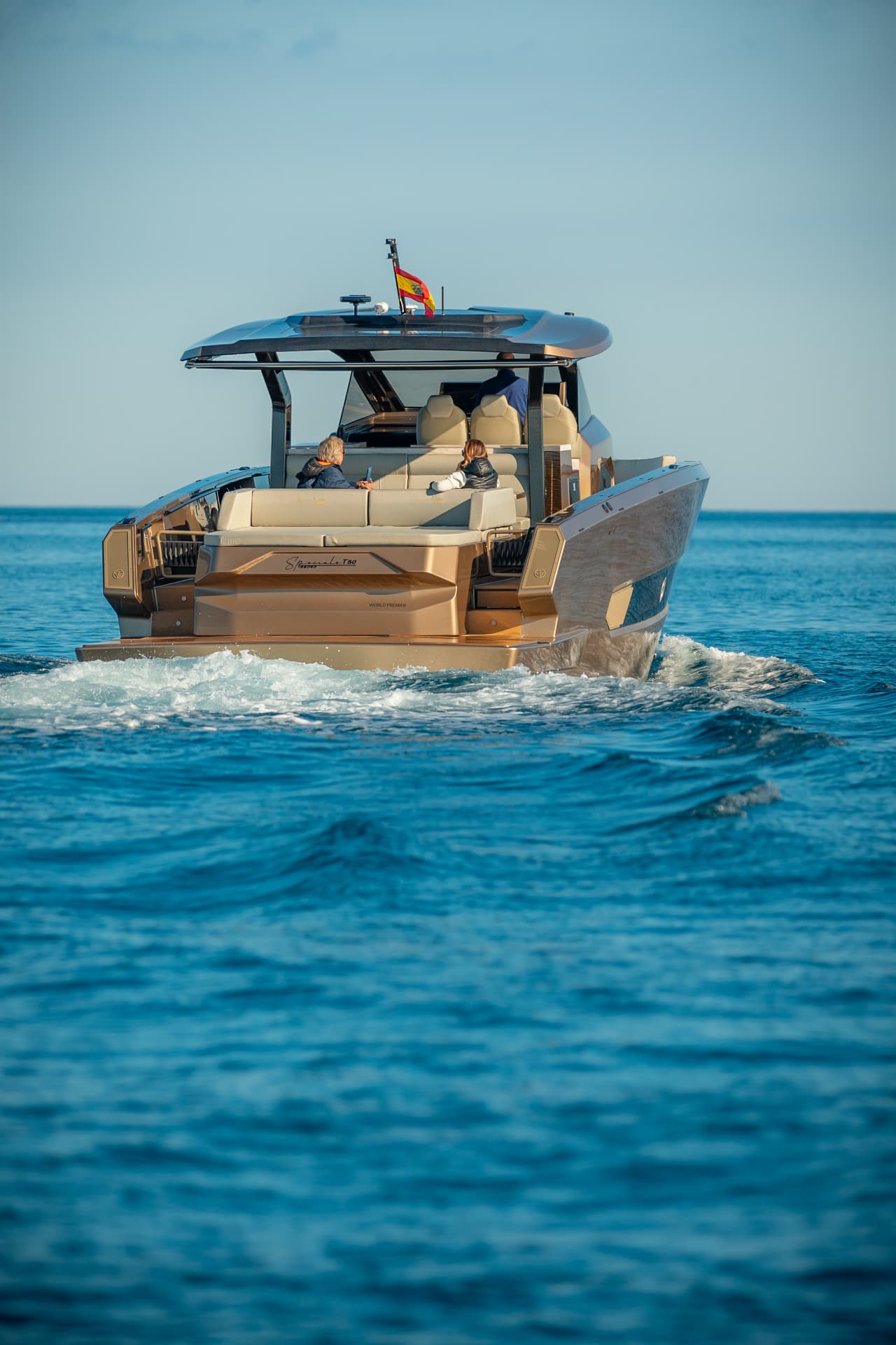 Tesoro T50 Speciale Goldfinger · Armani/Casa yacht charter in Mallorca — aft deck and swim platform ready for a day of swimming, from Club de Mar, Palma.