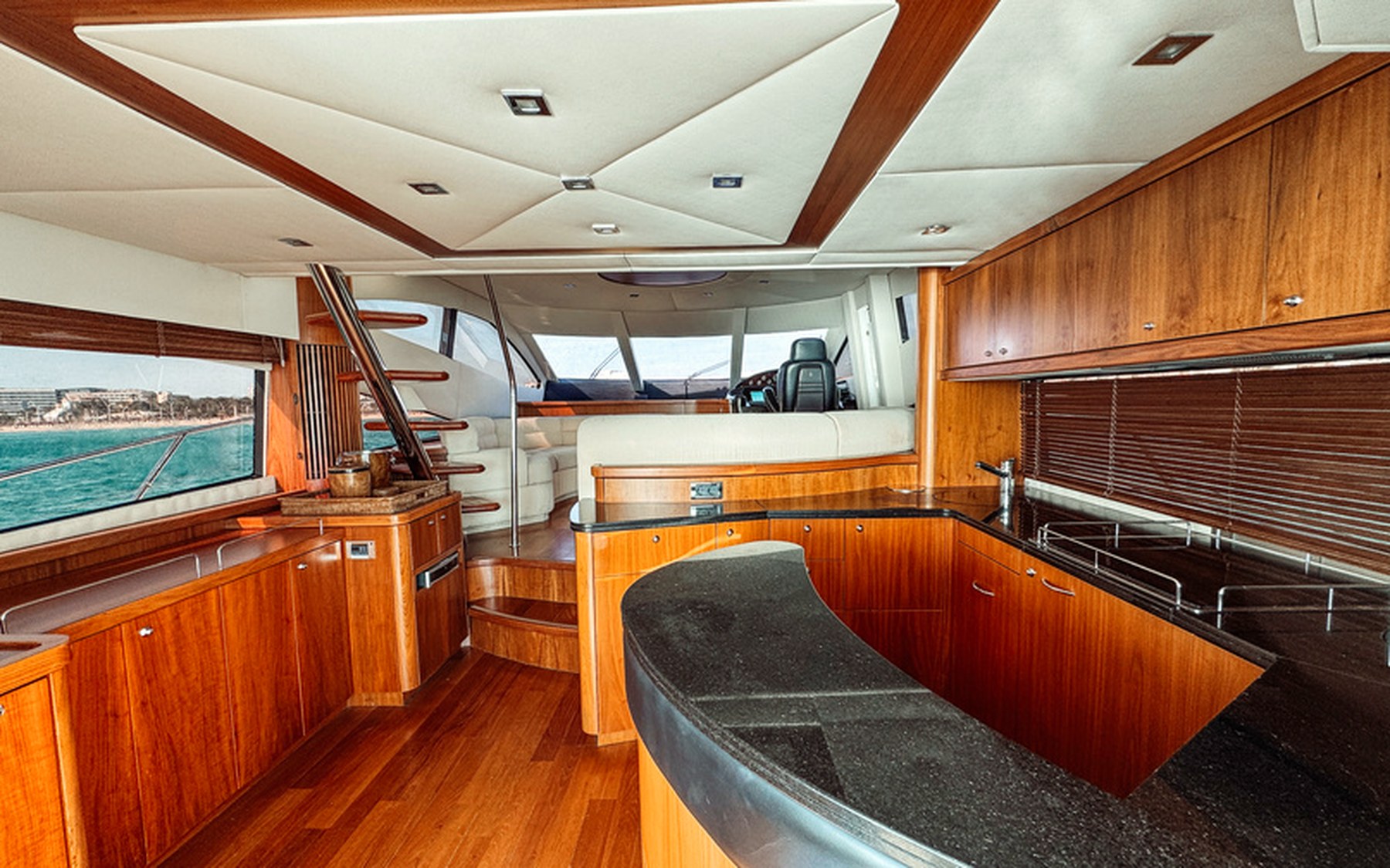 Sunseeker Manhattan 66 Tapia Bay yacht charter in Mallorca — bow sunpads with views over the Balearic sea, from Marina Port, Palma de Mallorca.