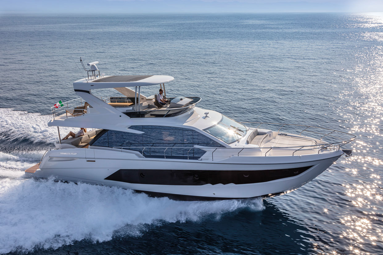 Absolute 62 Fly Emilia II yacht charter in Mallorca — cruising the south-west coast of Mallorca on a sunlit afternoon, from Marina Port de Mallorca, Palma.