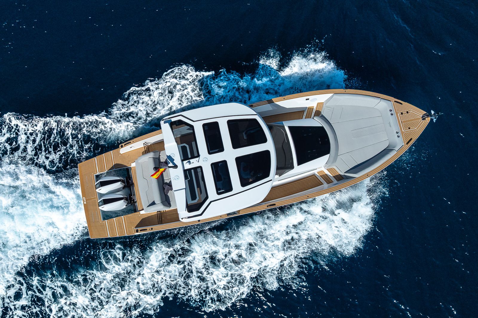 Tesoro T40 GTS New 2026 yacht charter in Mallorca — aft deck and swim platform ready for a day of swimming, from Puerto Portals.