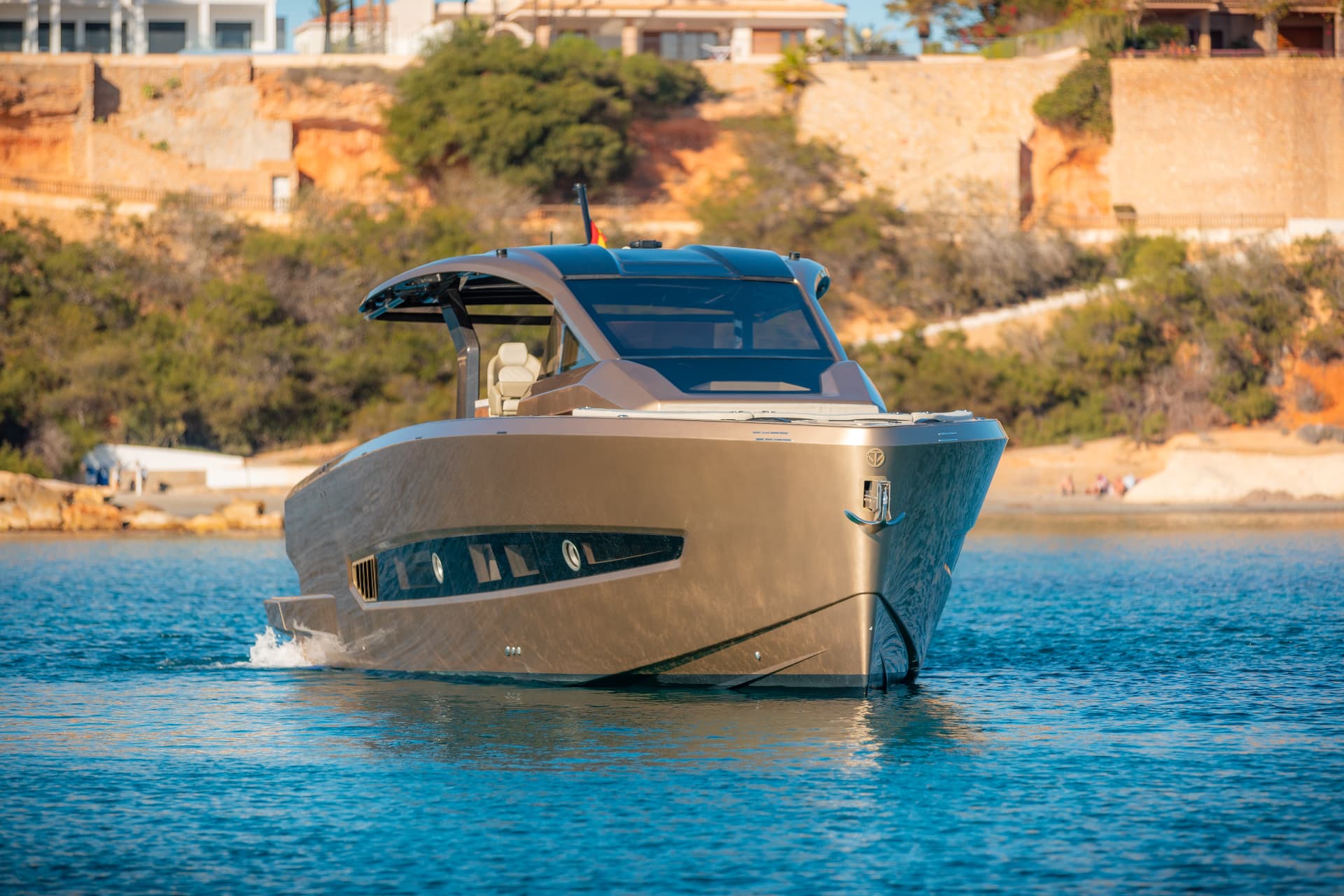 Tesoro T50 Speciale Goldfinger · Armani/Casa yacht charter in Mallorca — helm station and interior details, from Club de Mar, Palma.