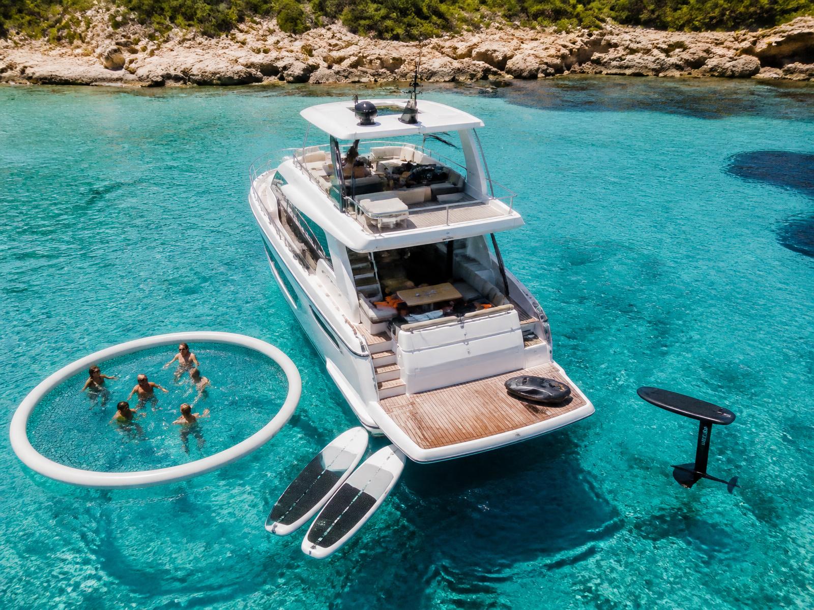 Stand up paddle boards, Seabob, eFoil and anti-jellyfish pool around a luxury charter yacht in Mallorca