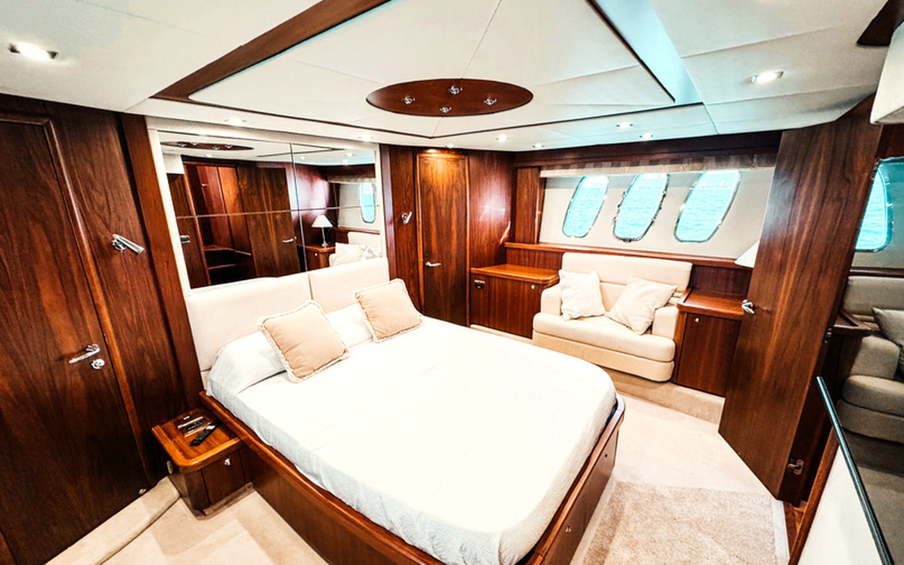 Sunseeker Manhattan 66 Tapia Bay yacht charter in Mallorca — helm station and interior details, from Marina Port, Palma de Mallorca.