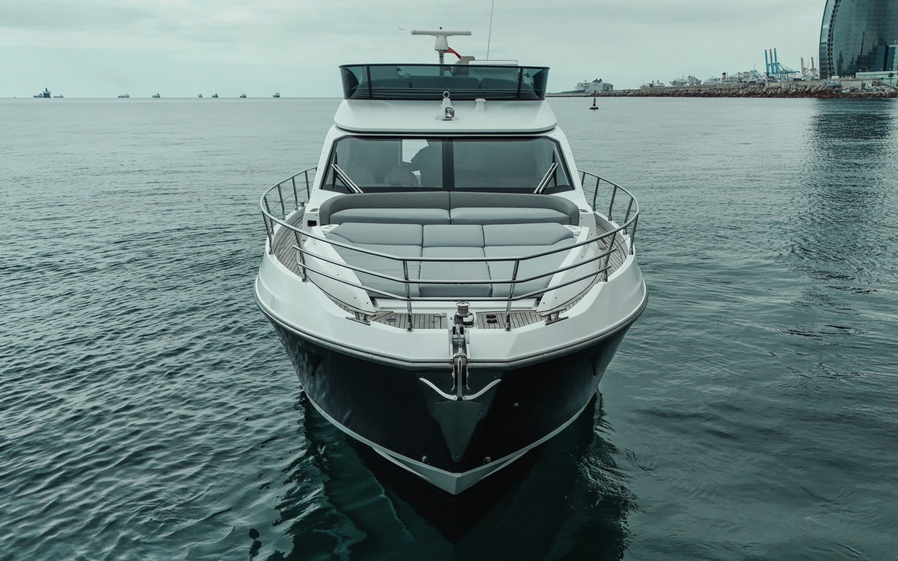 Azimut 53 Sea Shell yacht charter in Mallorca — bow sunpads with views over the Balearic sea, from Marina Palma, La Lonja.