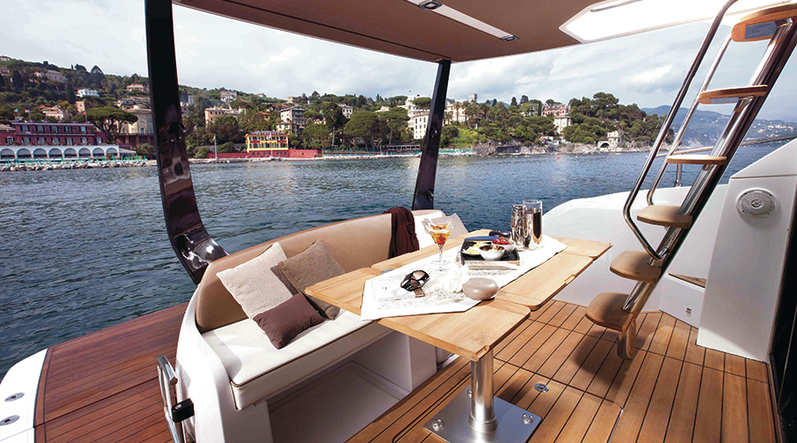 Sessa 40 Fly Zantastic yacht charter in Mallorca — bow sunpads with views over the Balearic sea, from Club Nàutic Porto Cristo.