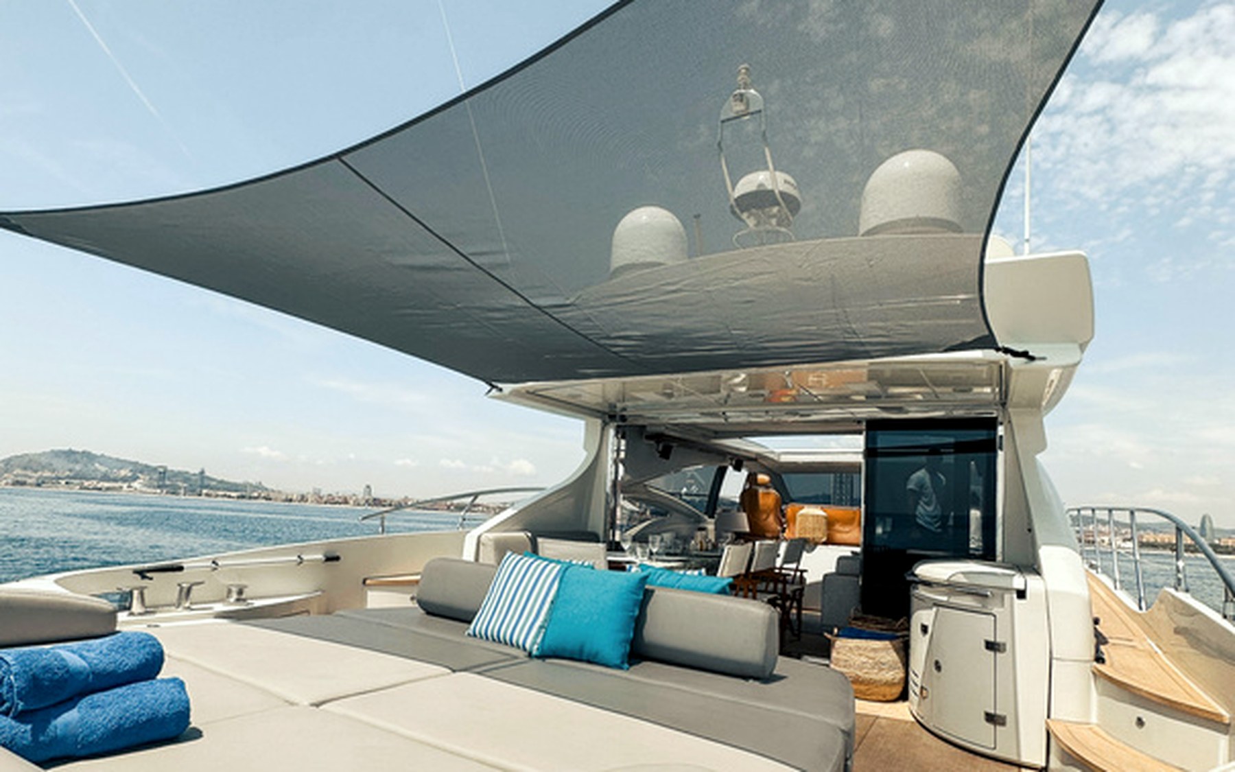 Azimut 68 S Esperanza yacht charter in Mallorca — anchored in a turquoise cove near Puerto Portals, from Marina Palma, La Lonja.