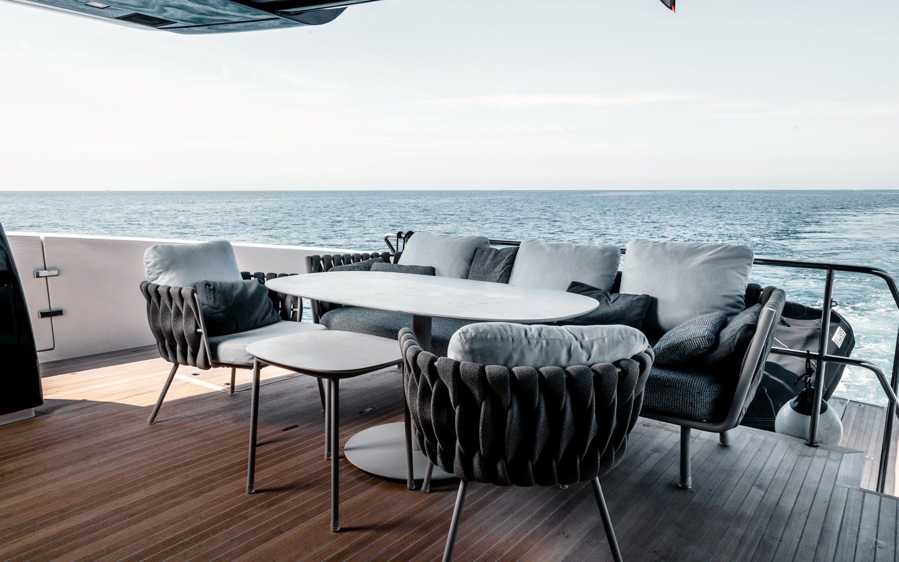 San Lorenzo SX76 Globito de Mar yacht charter in Mallorca — bow sunpads with views over the Balearic sea, from Marina Port, Palma de Mallorca.